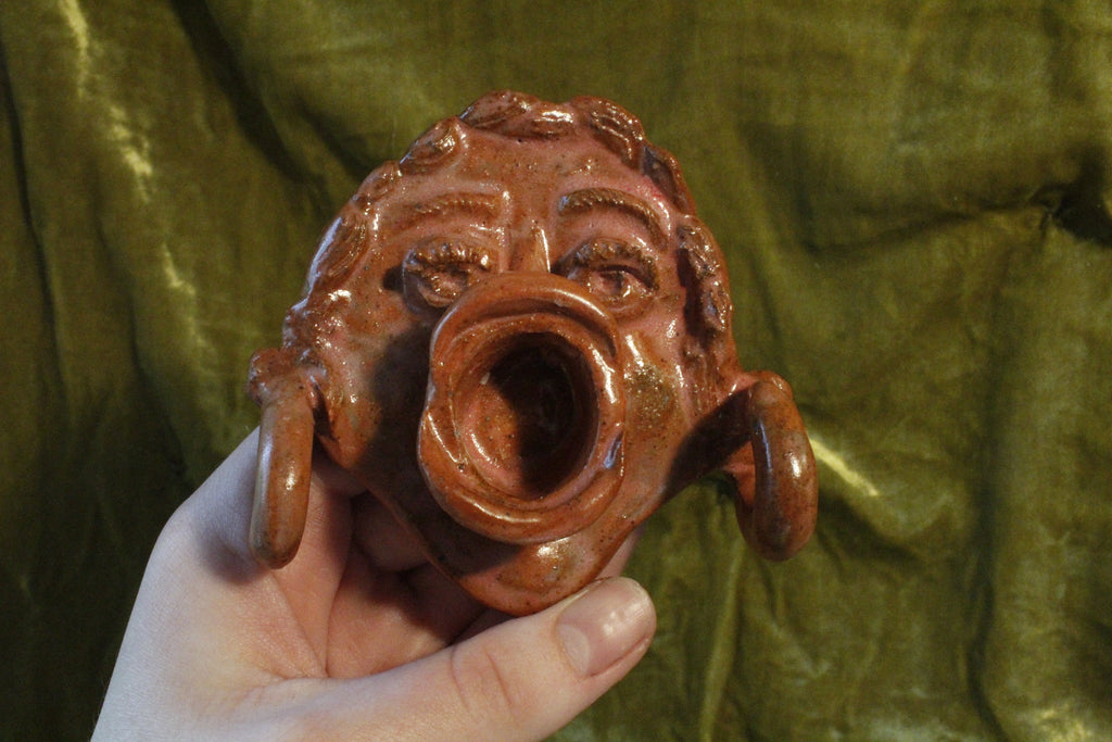 Personified Candle Holder